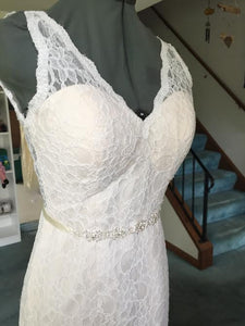 Custom 'Madeline' size 6 used wedding dress front view on mannequin