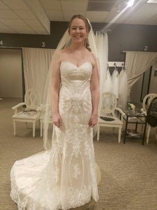 Custom Boutique 'Private Collection' size 8 new wedding dress front view on bride