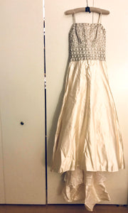 Private Collection 'Rahmanian Haute Couture' size 8 used wedding dress front view on hanger