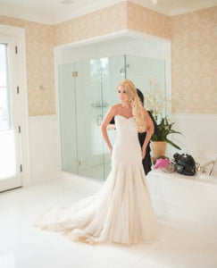 Mark Zunino 'Stunning' size 4 used wedding dress front view on bride