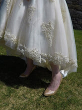 Load image into Gallery viewer, House of Mooshki &#39;Bespoke Alice&#39; size 12 new wedding dress view of hemline
