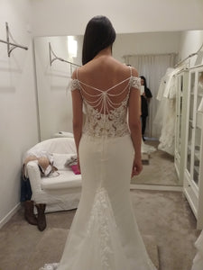 Nicole Spose 'NIAB 1840' size 6 used wedding dress back view on bride