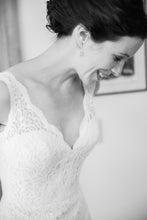 Load image into Gallery viewer, Mikaella &#39;2016&#39; size 4 used wedding dress front view close up on bride
