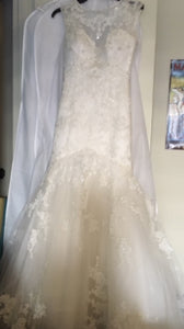Casablanca 'Celebrate Forever' size 2 sample wedding dress front view on hanger