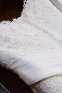 Demetrios '120' size 2 used wedding dress close up of lace