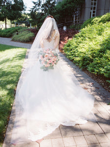 Romona Keveza 'L5100' size 8 used wedding dress back view on bride