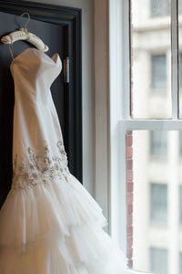 Badgley Mischka 'Ruth' size 4 used wedding dress side view on hanger