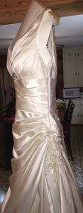 A.C.E. 'Exclusive Bridals' size 6 used wedding dress side view on hanger