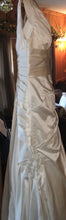 Load image into Gallery viewer, A.C.E. &#39;Exclusive Bridals&#39; size 6 used wedding dress side view on hanger
