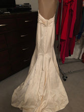Load image into Gallery viewer, Custom &#39;Classic/Sexy&#39; size 4 used wedding dress back view on hanger

