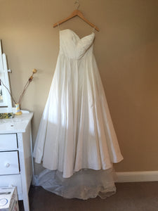 Watters 'Gobi' size 10 sample wedding dress front view on hanger