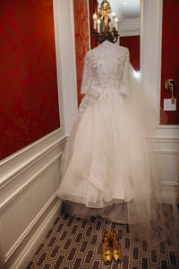 Natasha Hanina 'Vintage' size 12 used wedding dress front view on haneger