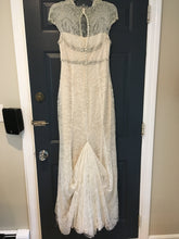 Load image into Gallery viewer, Vera Wang &#39;Lace and Chiffon&#39; size 6 used wedding dress back view on hanger
