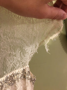 Vera Wang 'Lace and Chiffon' size 6 used wedding dress view of tear