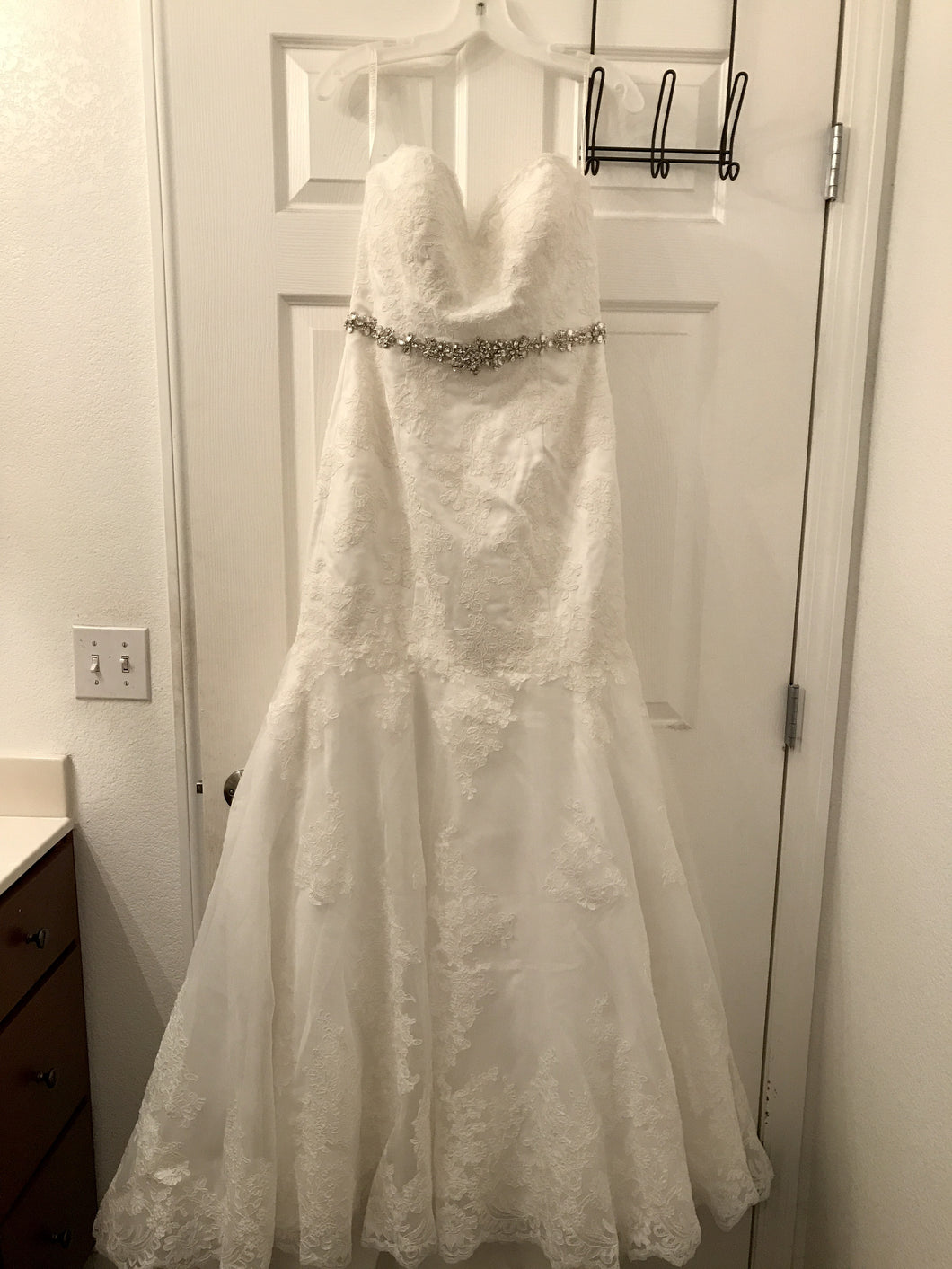 David's Bridal 'Sweetheart Trumpet' size 10 new wedding dress front view on hanger