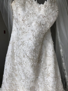 Michelle Roth 'Eda' size 10 used wedding dress front view on hanger