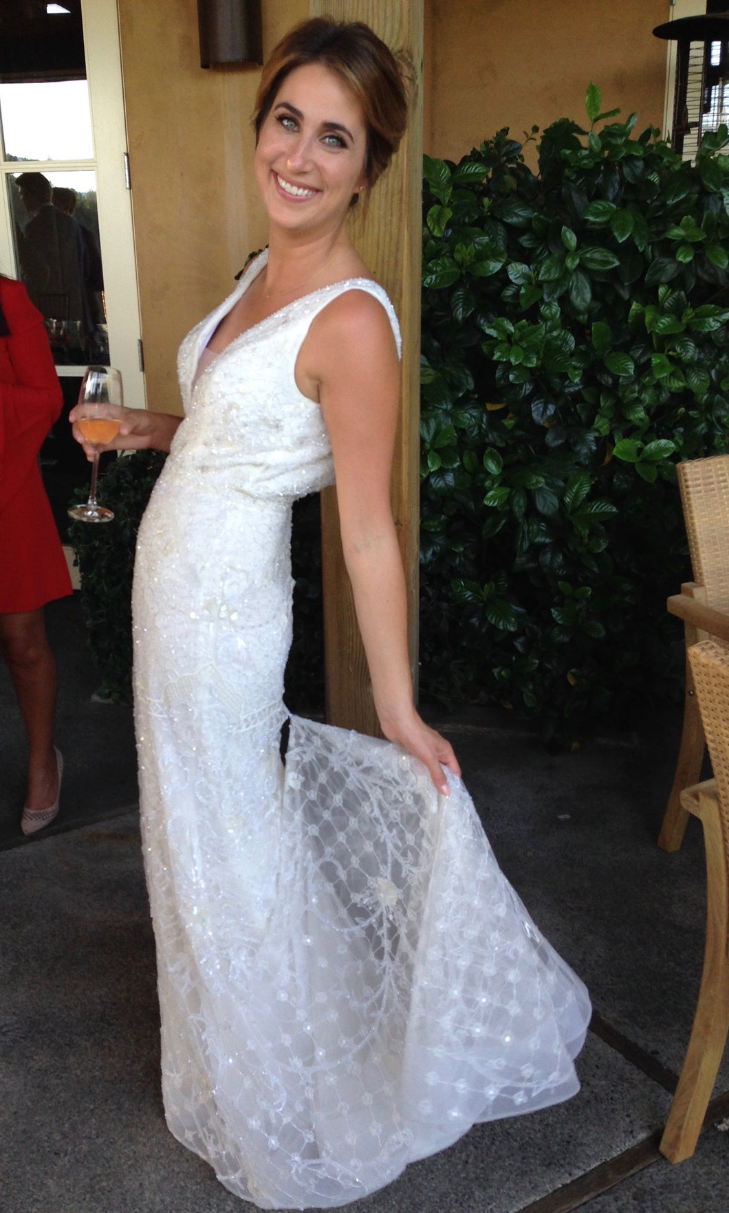 Lazaro 'Alexis' size 0 used wedding dress side view on bride