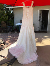 Load image into Gallery viewer, Essense of Australia &#39;D1617DM&#39; size 6 new wedding dress back view of hemline
