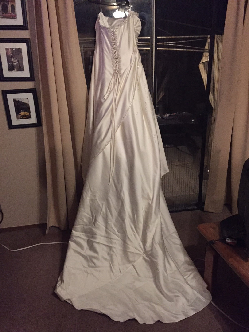 Maggie Sottero 'Jeweled' size 18 used wedding dress back view on hanger