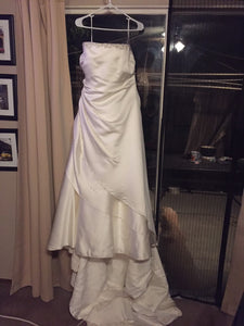Maggie Sottero 'Jeweled' size 18 used wedding dress front view on hanger