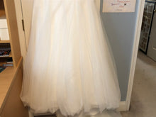 Load image into Gallery viewer, Cosmobella &#39;7693&#39; size 14 sample wedding dress view of hemline
