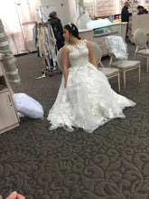 Load image into Gallery viewer, Oleg Cassini &#39;High Neck&#39; size 10 used wedding dress front view on bride

