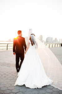 Custom 'New York by Isaac Mizarahi' size 4 used wedding dress back view on bride