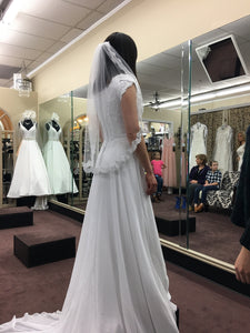 Bonny Bridal 'Sequin' size 4 used wedding dress side view on bride