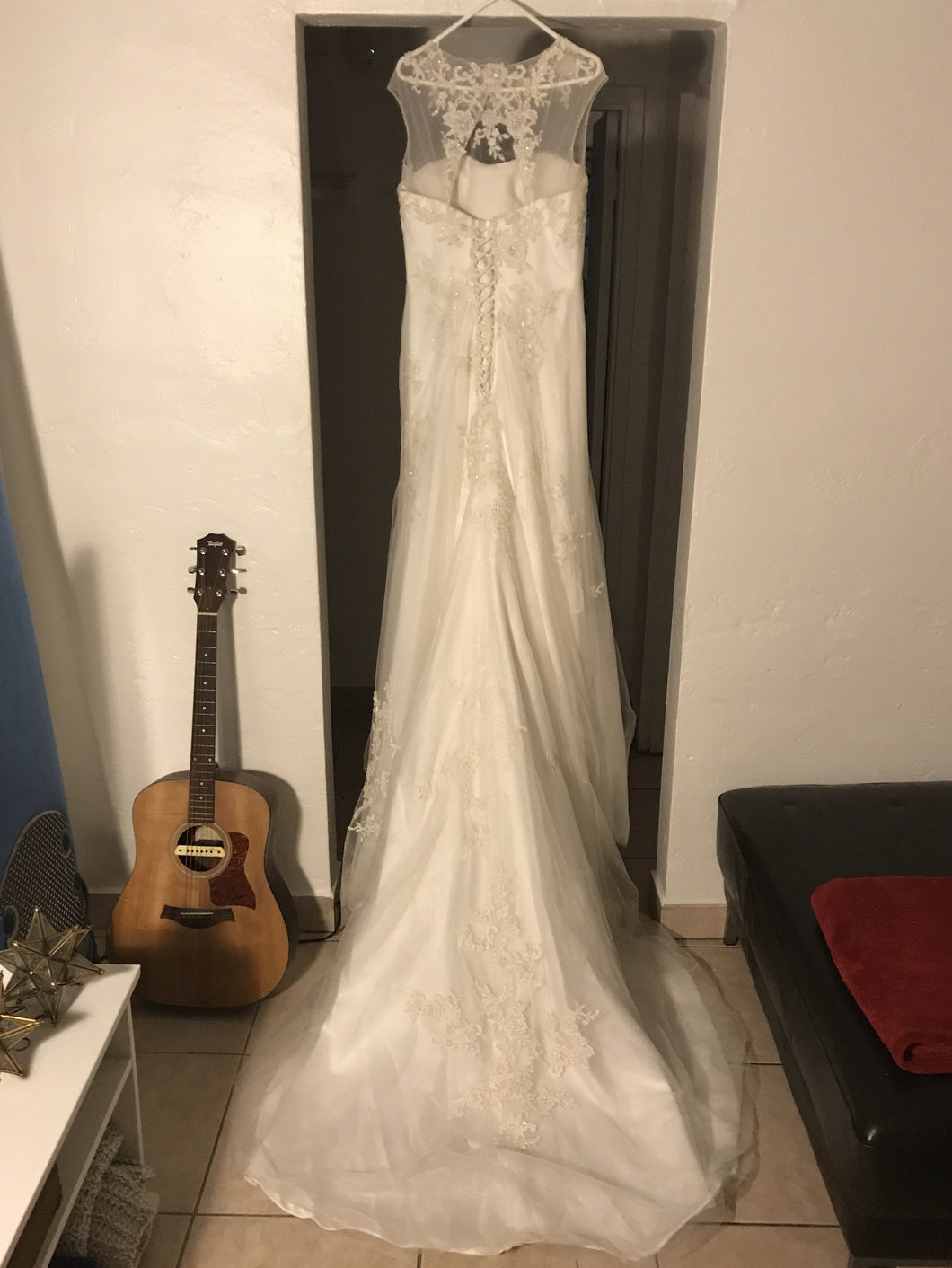 Custom 'Beautiful' size 12 used wedding dress back view on hanger