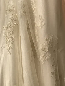 Custom 'Beautiful' size 12 used wedding dress view of fabric