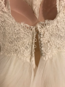 Lazaro 'Princess' size 6 used wedding dress back view on hanger