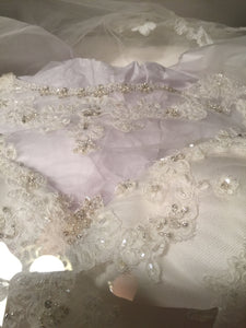 Casablanca '2110' size 10 used wedding dress close up of fabric