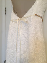 Load image into Gallery viewer, Demetrios &#39;1443&#39; size 4 used wedding dress back view on hanger

