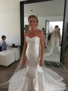 Romona Keveza 'Legends' size 8 used wedding dress front view on bride