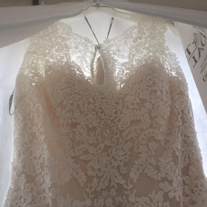 Maggie Sottero 'Melanie' size 8 new wedding dress front view on hanger