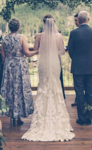 Justin Alexander 'Custom' size 8 used wedding dress back view on bride