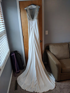Eddy K. '1132' size 8 used wedding dress back view on hanger