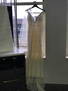 Eugenia Couture 'Timeless' size 8 used wedding dress front view on hanger