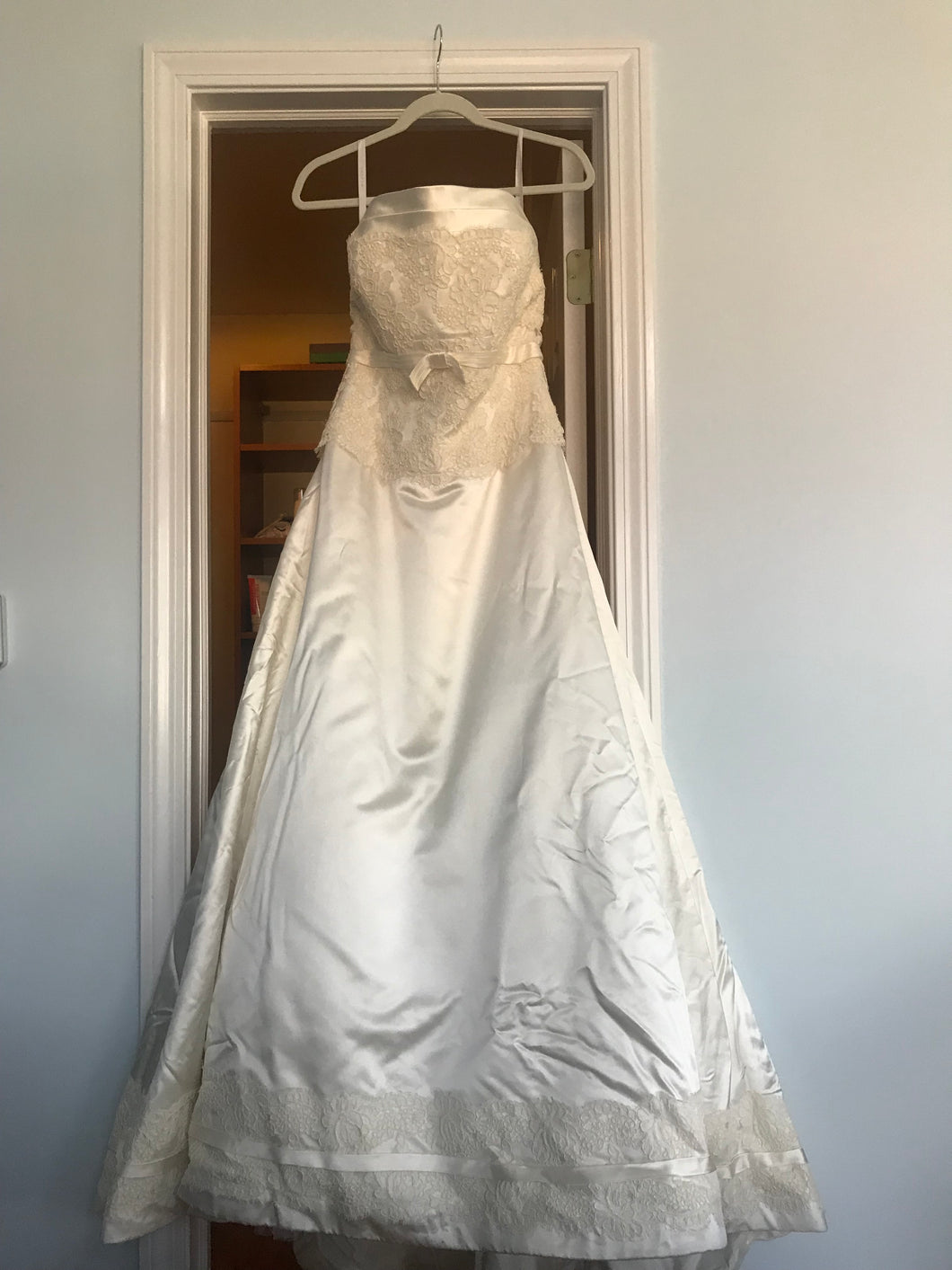 Rivini 'Off White Silk' size 8 used wedding dress front view on hanger