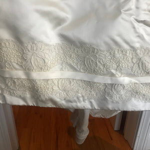 Rivini 'Off White Silk' size 8 used wedding dress view of hemline