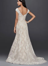 Load image into Gallery viewer, Oleg Cassini &#39;Lace&#39; size 6 used wedding dress back view on model
