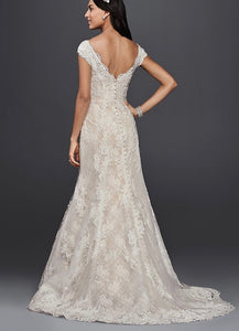 Oleg Cassini 'Lace' size 6 used wedding dress back view on model
