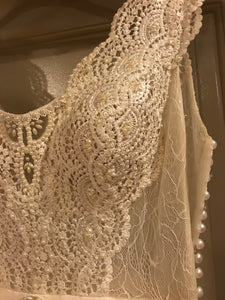 Flora Bridal 'Madeline' size 4 sample wedding dress front view close up on hanger