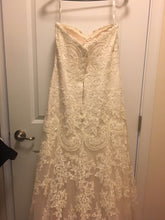 Load image into Gallery viewer, David Tutera &#39;Strapless&#39; size 12 used wedding dress back view on hanger

