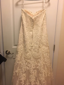 David Tutera 'Strapless' size 12 used wedding dress back view on hanger