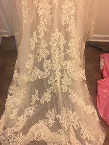 David Tutera 'Strapless' size 12 used wedding dress close up of fabric