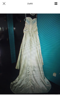 Load image into Gallery viewer, Custom &#39;Strapless&#39; size 6 used wedding dress back view on hanger
