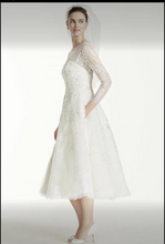 Load image into Gallery viewer, Oleg Cassini &#39;Tea Length&#39; size 6 new wedding dress side view on model
