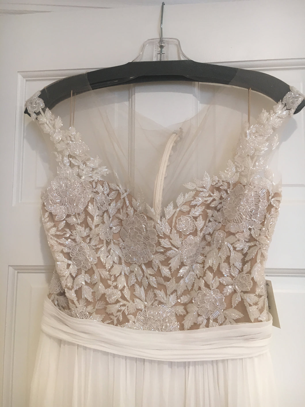 Reem Acra 'Juliet' size 6 new wedding dress front view on hanger