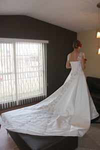 Jai International 'Rose Pink' size 4 new wedding dress back view on model
